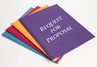 Image of folders stacked with "Request for Proposal" on the top folder