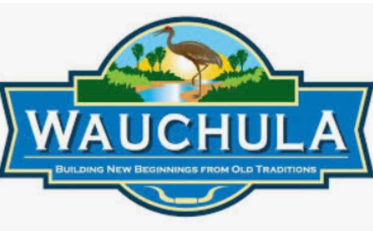 City of Wauchula Logo, crane, grass,